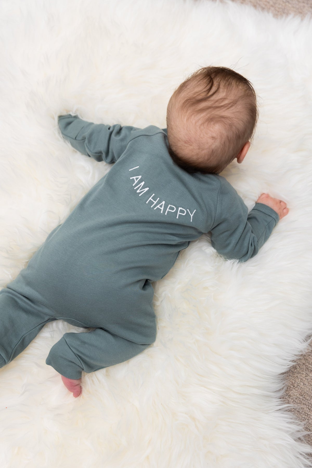 100% Organic Cotton Baby onesie with I AM HAPPY Affirmation Embroidery