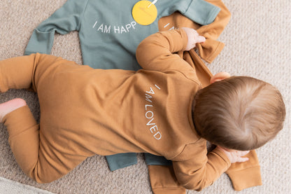 100% Organic Cotton Baby onesie with I AM LOVED Affirmation Embroidery