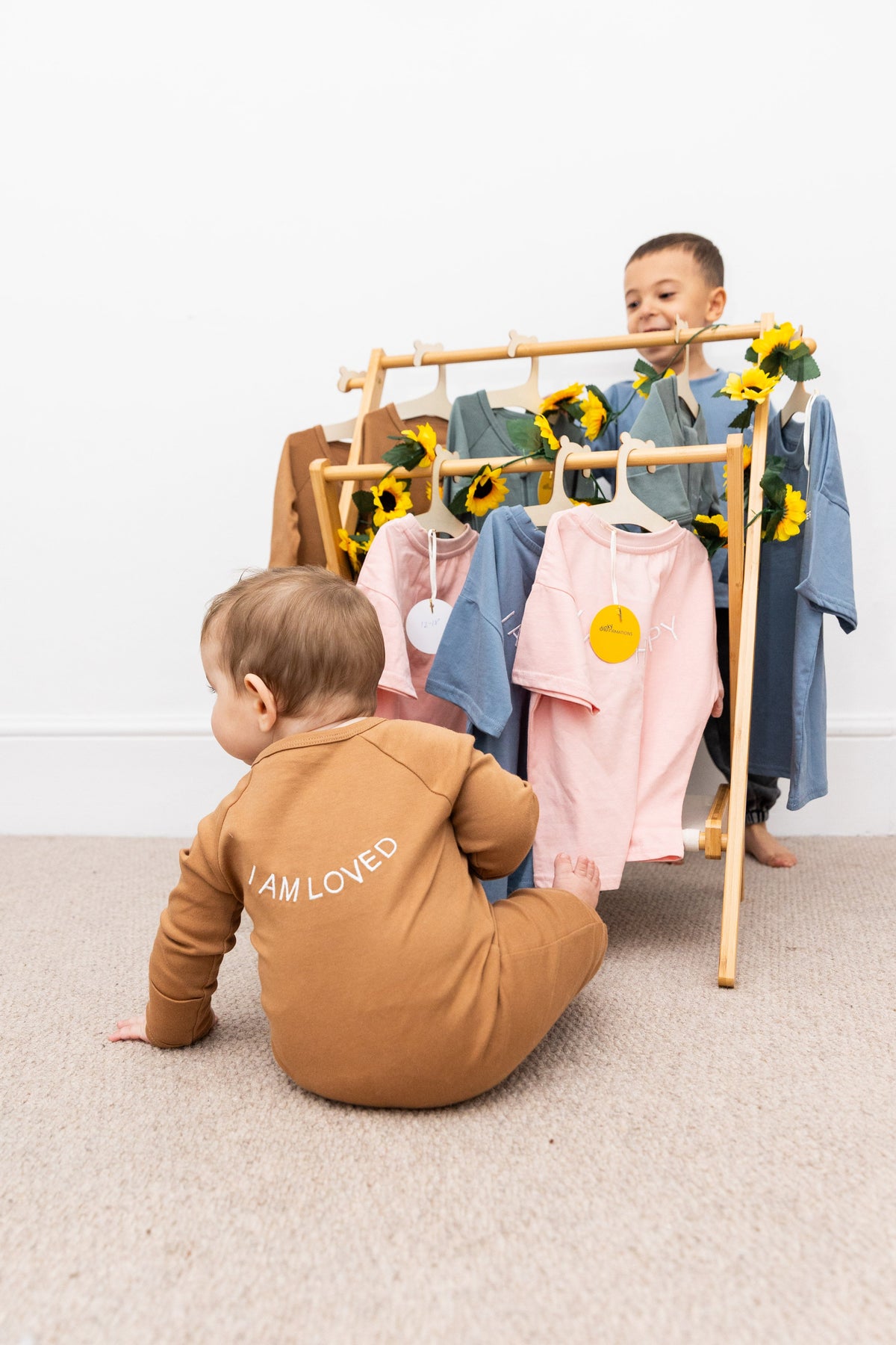 100% Organic Cotton Baby onesie with I AM HAPPY Affirmation Embroidery